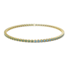Bracelet tennis élastique à facettes avec pierres précieuses topaze en or jaune 750/18 carats