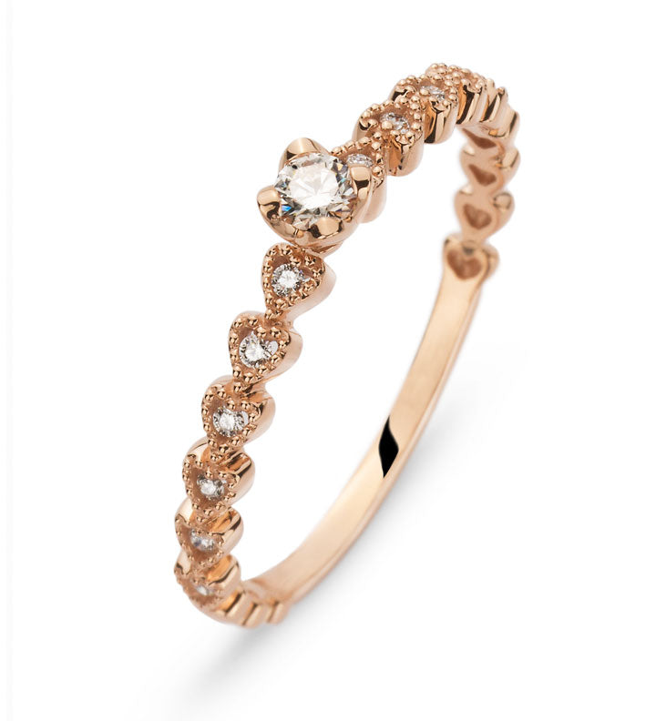 Ring Rotgold 750 mit 1 Brillant & 12 Seitenbrillanten