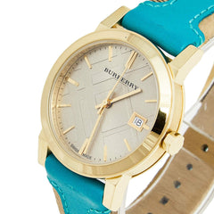 Burberry BU9112 The City Damen Uhr – Gold & Blau Leder – Swiss Quartz – 36 mm