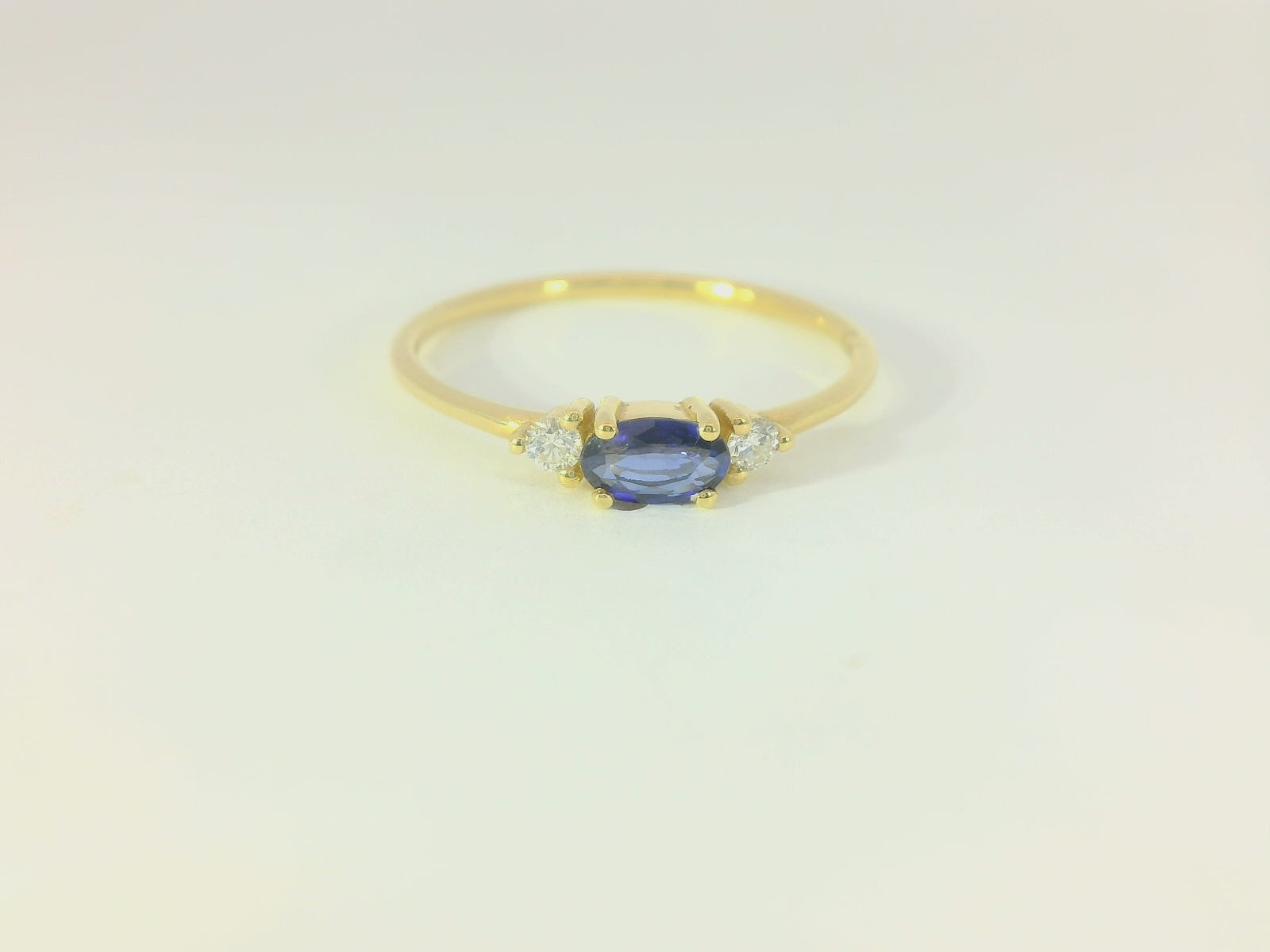 Bague femme en or jaune 18 carats, 16 diamants et topaze bleue – Élégance intemporelle – BYZ0003326 